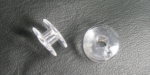 Пластиковая катушка для бытовых швейных машин Singer (округлая)